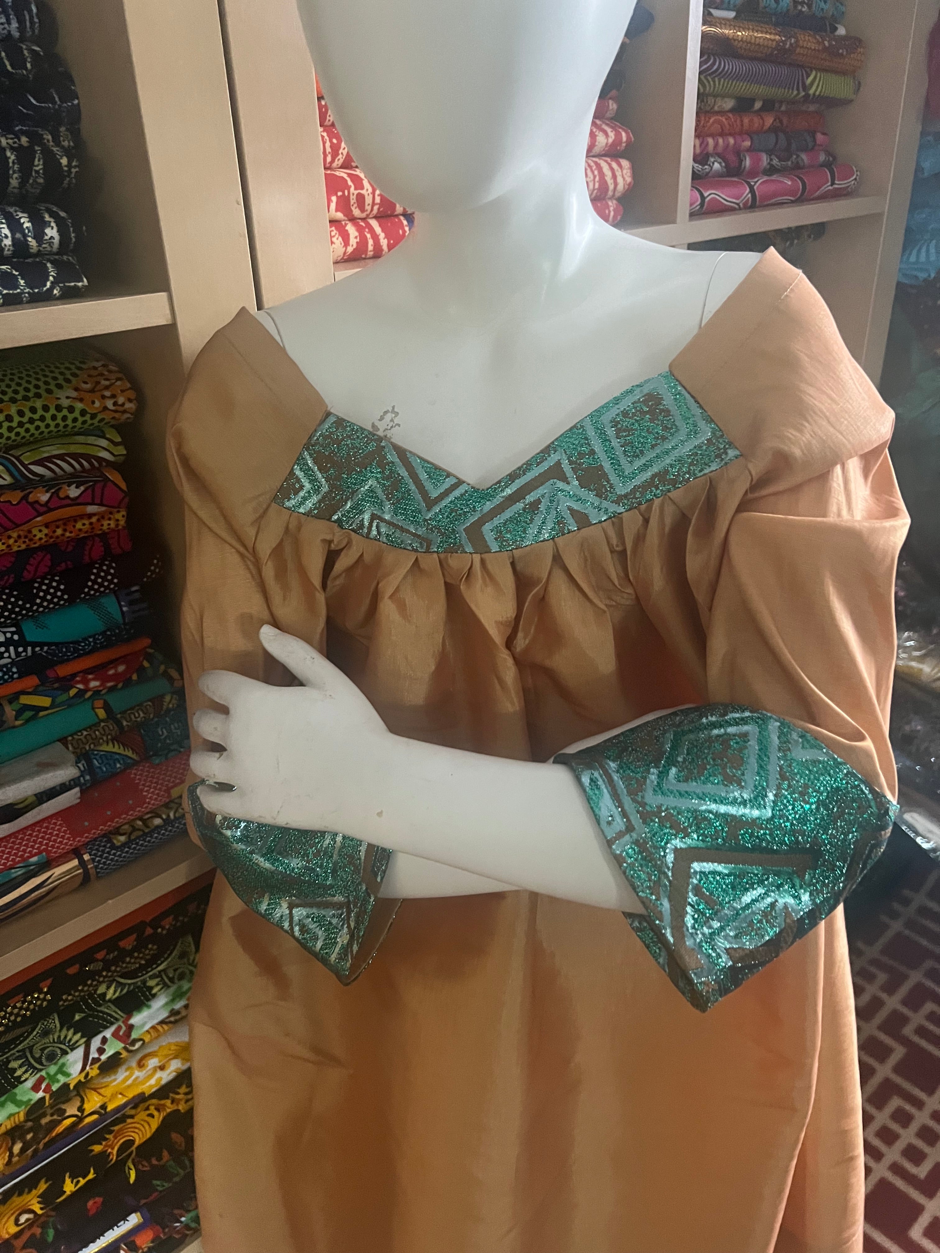 Kaba Gondo for kids African clothes sewing with a taffeta and green jacquard fabrics with a comfortable long sleeve for any walk