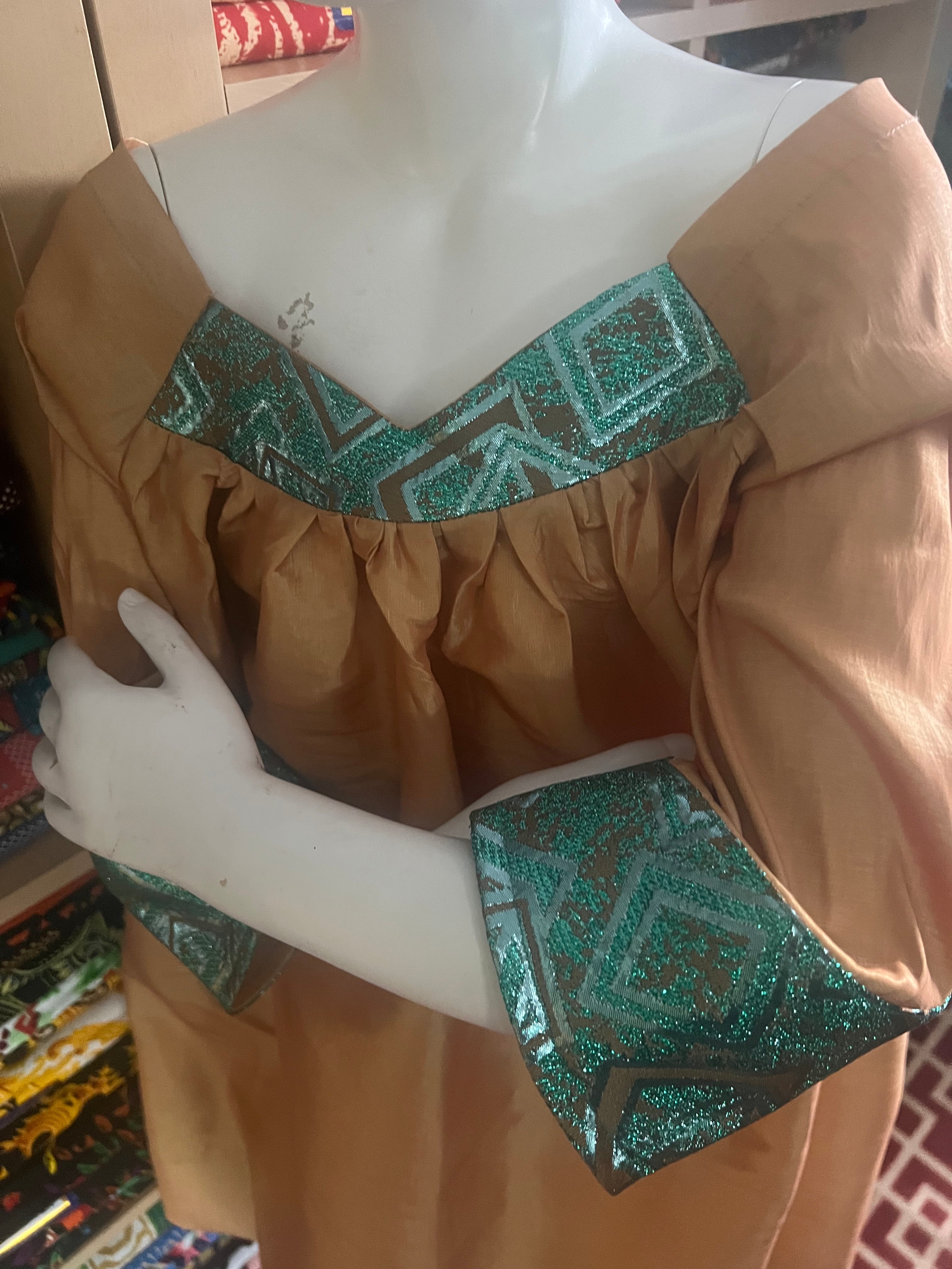 Kaba Gondo for kids African clothes sewing with a taffeta and green jacquard fabrics with a comfortable long sleeve for any walk